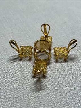 Minitiques dollhouse miniature set 
gold-plated mesh top table
four chairs